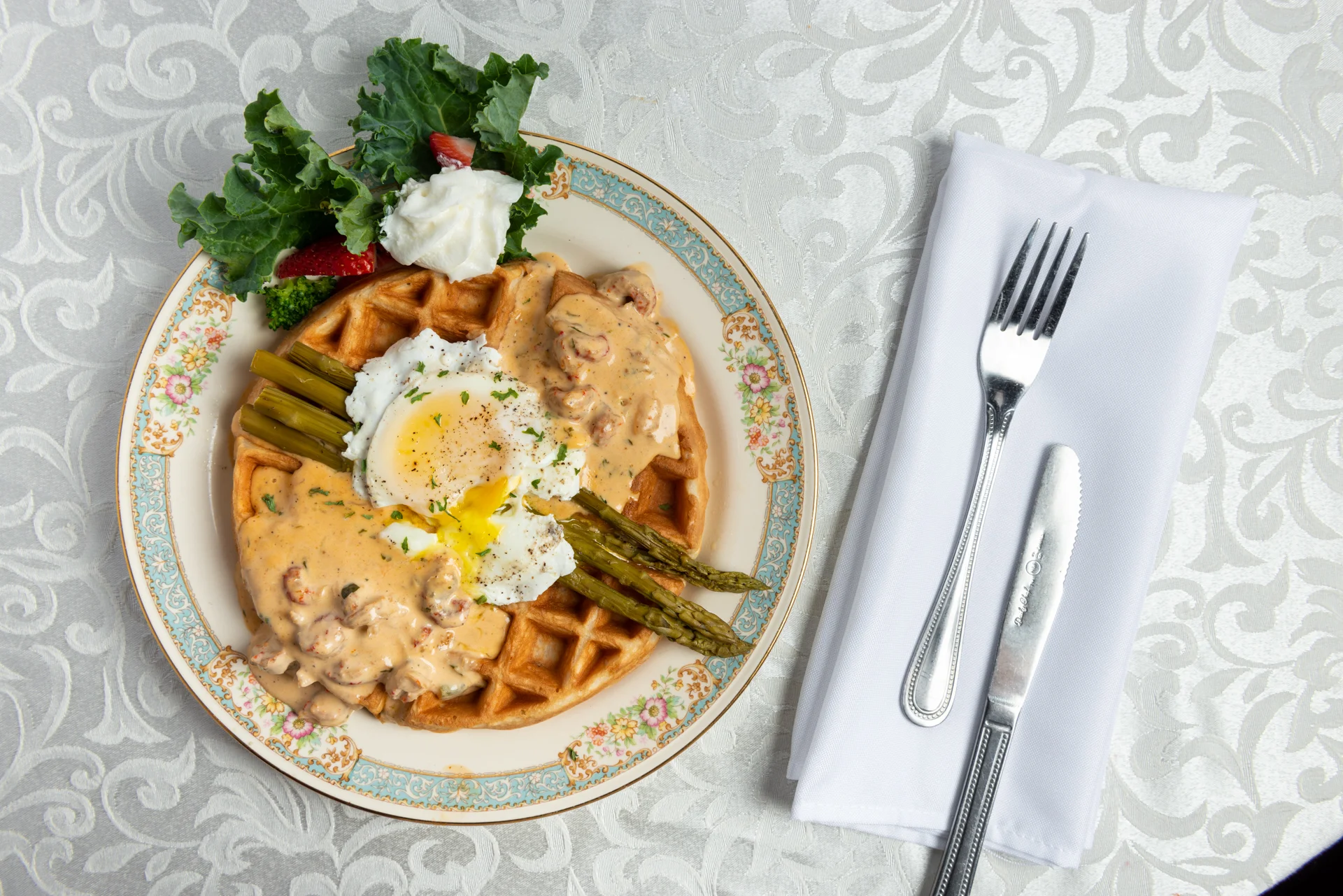 waffle with asparagus and egg on top